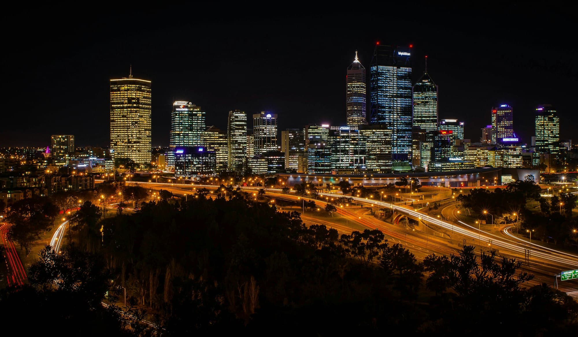Perth city skyline at night with city lights and freeway